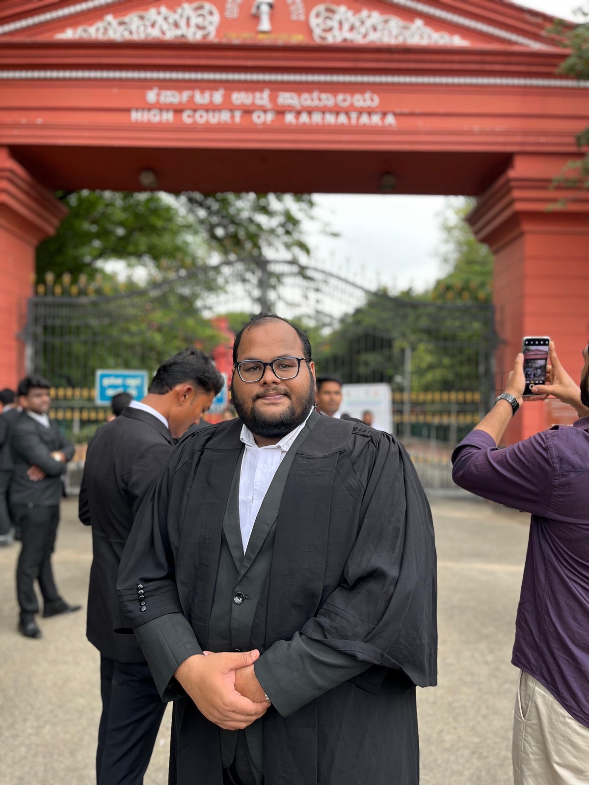 Advocate at the High Court of Karnataka gate